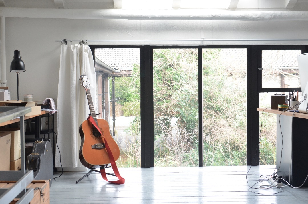 A double entry doors for interior of a room for a musician